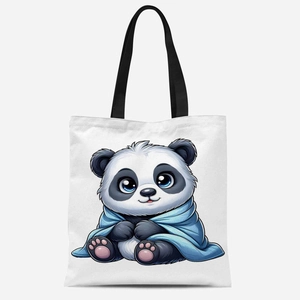 Detail shot of a cute cartoon panda print on a durable white canvas tote bag