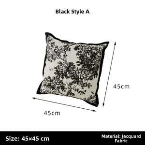 Detail of 45x45cm black and white chenille cushion cover with floral jacquard texture