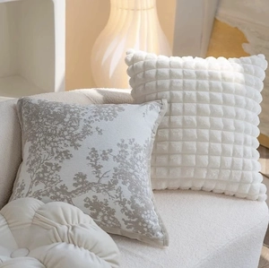 Minimalist chenille pillow cover set with grey tree pattern and white textured plush fabric