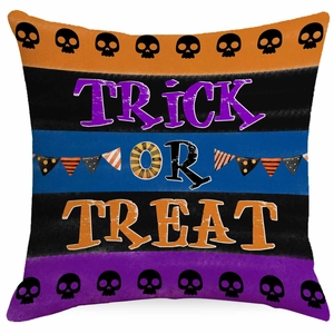 Halloween pillow cover with multi-color stripes, skulls and Trick or Treat typography