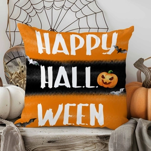 Detail of Happy Halloween pillow case with pumpkin and bat prints on linen fabric