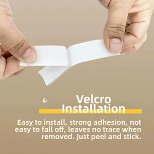 Detail showing adhesive hook and loop tape for easy installation of Christmas wall banners