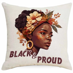 Macro detail of linen pillowcase featuring a black woman art print and Black & Proud text