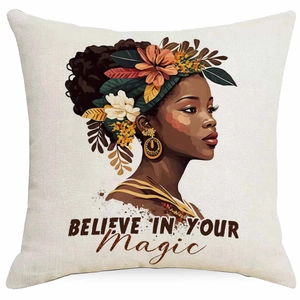 Macro detail of linen pillowcase featuring a floral African girl and Believe in Your Magic text