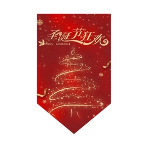 Detail of red Christmas bunting flag featuring a golden tree design and Merry Christmas text