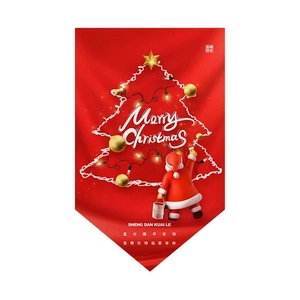 Close-up of red Christmas bunting flag featuring Merry Christmas text and tree design