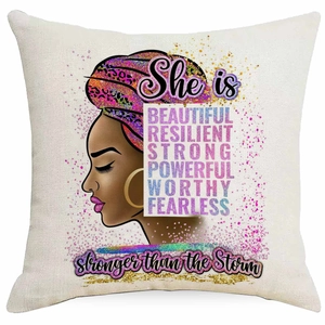 Artistic African woman linen pillow cover with She is Stronger than the Storm quote