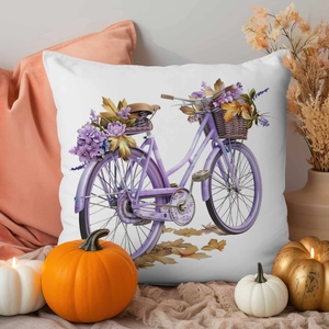 Detailed close-up of lavender bicycle pillow cover in a cozy autumn setting with pumpkins