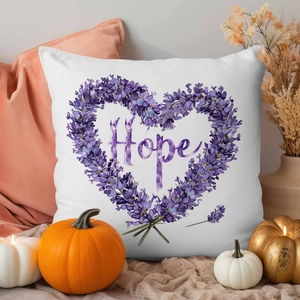 Detail of white Hope cushion cover with purple lavender heart and autumn pumpkin decor