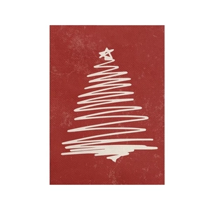 Detailed view of red canvas Christmas banner with minimalist white hand-drawn tree design