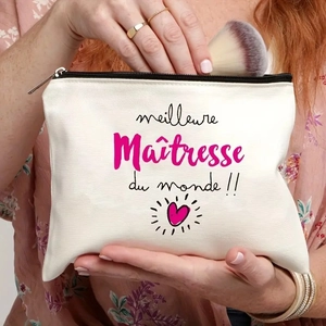 Close-up of canvas makeup bag with teacher print being used for storing brushes