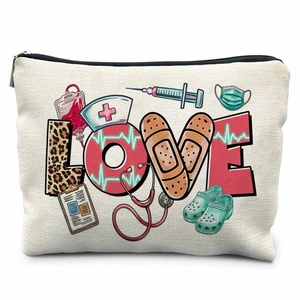 Detailed macro of thick canvas nursing makeup bag with medical symbols and love print