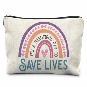Canvas makeup bag for nurses with rainbow and heart pattern on white background