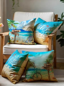 Détail de housses de coussin en lin aux motifs de chaises de plage et de palmiers