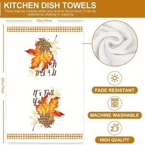 Detail of soft microfiber kitchen towel with autumn maple leaf print and fabric texture