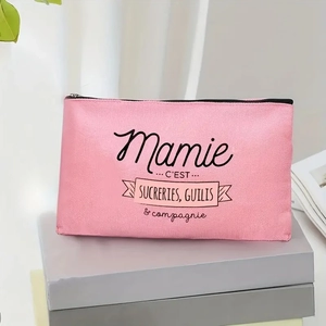 Détail de la trousse de maquillage rose en toile avec texte français et fermeture éclair