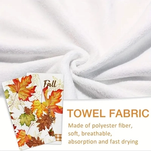 Close-up of soft microfiber towel with autumn maple leaf prints and high water absorption