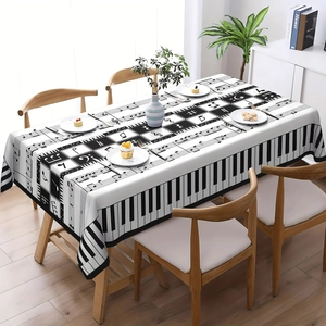 Elegant piano themed tablecloth with musical notes and keyboard pattern for dining decor