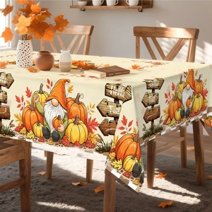 Detailed view of Hello Fall table runner featuring festive gnomes and autumn pumpkins