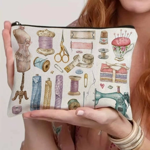 Vintage canvas sewing kit storage bag featuring watercolor prints and black zipper