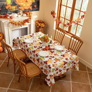 Close-up of autumn falling leaves pattern on rectangle tablecloth for Thanksgiving dining