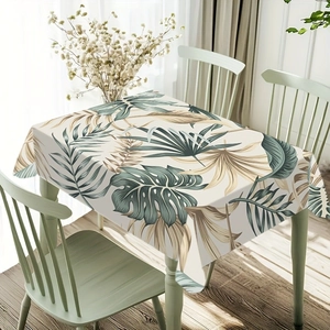 Close-up of tropical palm leaf pattern on a high-quality rectangular decorative tablecloth