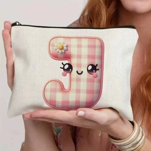 Handheld cream canvas pouch with pink checkered cartoon J and flower pattern