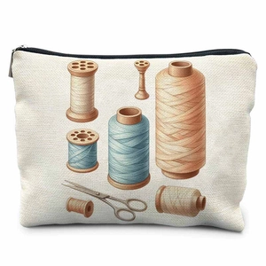 Canvas sewing kit organizer bag with vintage spool and scissors print on white background