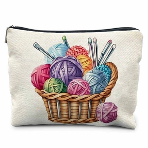 Canvas organizer bag with colorful knitting yarn and needle print for storage