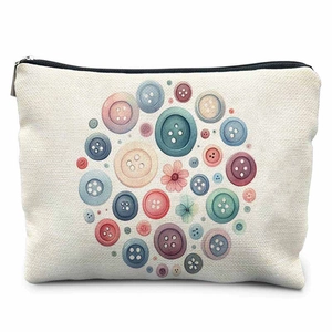 Close-up of cream canvas storage bag featuring colorful button print and silver zipper