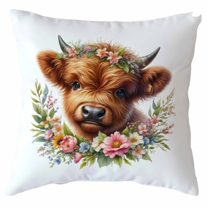Close-up of highland cow calf with flower crown print on a square white cushion cover