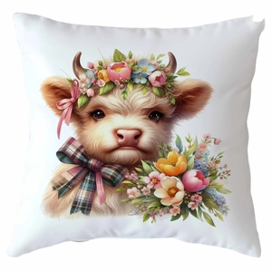 Close-up of highland cow calf print with floral crown and plaid bow on white pillow