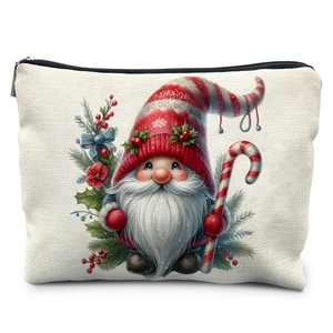 Detailed view of linen Christmas gnome makeup bag with festive watercolor print and black zipper