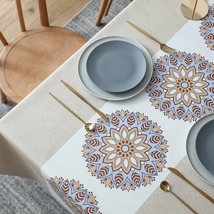 Detail of bohemian mandala pattern table runner with vintage geometric floral print
