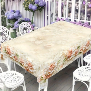 Detail of 3D rose embroidery and delicate lace edge on a champagne floral tablecloth