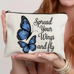 Canvas makeup bag with blue butterfly print and Spread Your Wings motivational quote