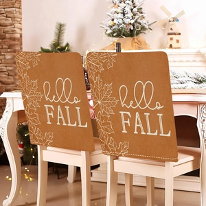 Fall themed Thanksgiving chair covers with pumpkin maple leaf and hello FALL text