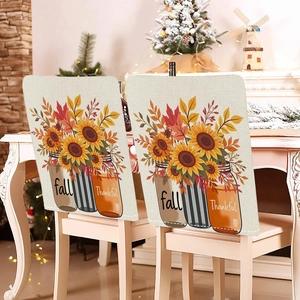 Fall Thanksgiving chair covers with sunflowers and pumpkins on textured beige fabric