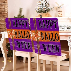 Set of two Halloween chair covers with purple stripes and Happy Halloween lettering