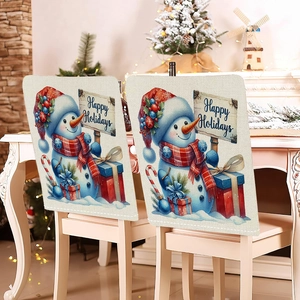 Close-up of linen Christmas chair cover with snowman design and Happy Holidays text