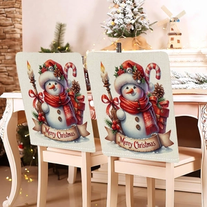 Detail of Christmas chair covers featuring cartoon snowmen and Merry Christmas prints