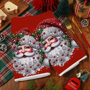Christmas themed red dish towels with Santa Claus print for holiday kitchen decor