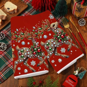 Christmas red kitchen towel with reindeer jewel pattern and white plush trim for decor