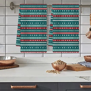 Christmas kitchen towel set with festive snowman and tree patterns on a hanging rod