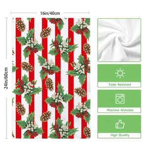 Detail of Christmas tree towel with holly berry pattern and 16x24 inch size specs