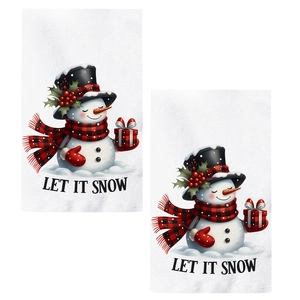 Christmas kitchen towels with festive snowman print and Let It Snow holiday pattern