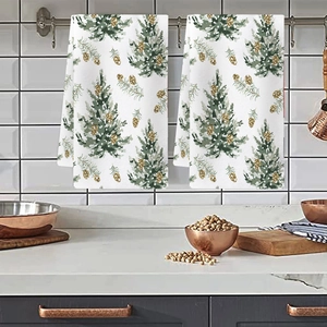 Christmas tree pattern tea towels set of 2 hanging on kitchen rail for holiday decor
