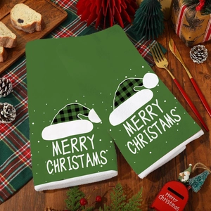 Green Christmas kitchen towel set with festive snowman print and Merry Christmas text