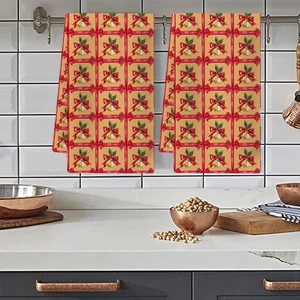 Absorbent Christmas kitchen towel set with festive golden bells and winter holly patterns
