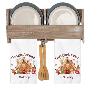 Christmas gingerbread bakery kitchen towel set with festive prints on white absorbent cloth